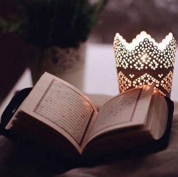Ramadan lantern beside a Mushaf